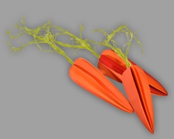 Bild von drei Tonpapierkarotten (Angela Merkel)