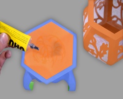 Lichterkugel auf Bodengestell kleben Bild vom Kleben der Lichterkugel auf das Bodengestell