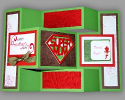 Aufkleben vom Gutscheinheft und der Aufschrift Happy Mother's Day