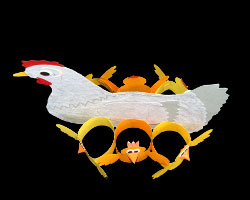 Osterhenne von oben Bild einer Papierhenne mit sechs Küken von oben fotografiert