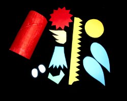 Bild von Bastelelementen für einen Papagei aus Klorollen