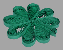 Quilling Kleeblatt Bild von grünem Quilling Kleeblatt als Glücksbringer für Silvester
