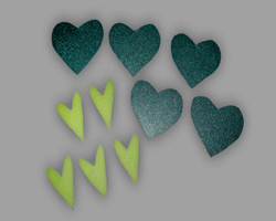 Kleeblätter aus Metallicpapier Basteln von Kleeblättern aus Metallicpapier