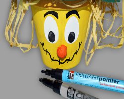 Bild von bemaltem Gesicht einer Vogelscheuche