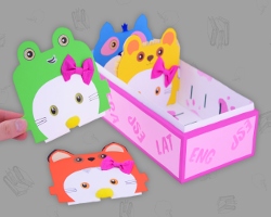 Hello Kitty mit Mütze im Vokabelkasten Bild von Hello Kitty mit Froschmütze im Vokabelkasten aus Papier