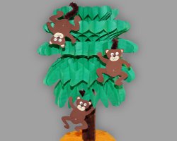 Bild von drei Papieraffen, welche an einer Papierpalme hängen