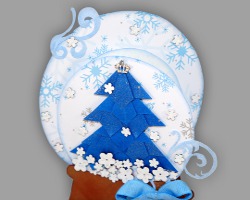 Selbst gebastelte Papierschneekugel als Weihnachtskarte